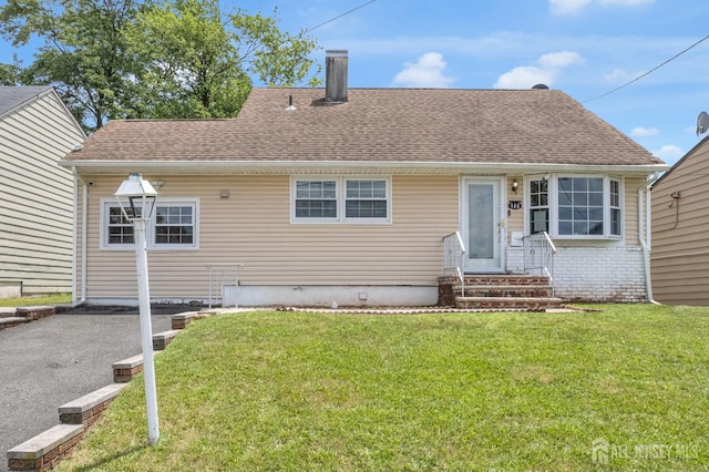 186 Tyler Ave, Iselin, NJ 08830 - rear view of property with a yard, a chimney, and roof with shingles