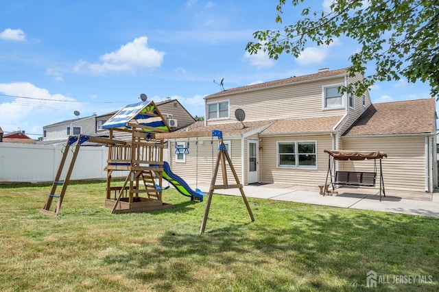 186 Tyler Ave, Iselin, NJ 08830 - back of property featuring a playground and a patio area
