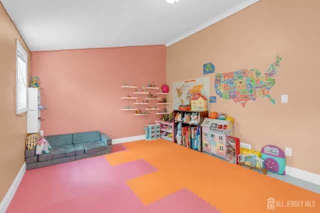 186 Tyler Ave, Iselin, NJ 08830 - recreation room with baseboards and crown molding