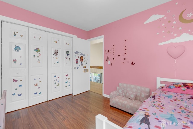186 Tyler Ave, Iselin, NJ 08830 - bedroom featuring wood finished floors and a closet