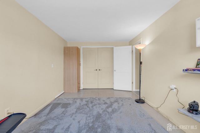 186 Tyler Ave, Iselin, NJ 08830 - unfurnished bedroom featuring baseboards and a closet