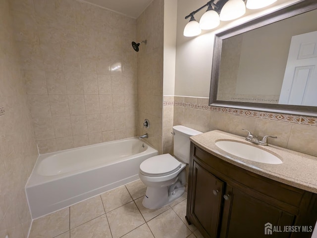 21 Rice Run, East Brunswick, NJ 08816 - bathroom with toilet, vanity,  shower combination, tile patterned flooring, and tile walls