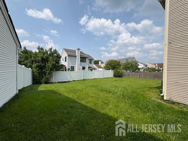 21 Rice Run, East Brunswick, NJ 08816 - view of yard featuring a residential view
