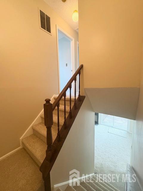 21 Rice Run, East Brunswick, NJ 08816 - staircase featuring carpet