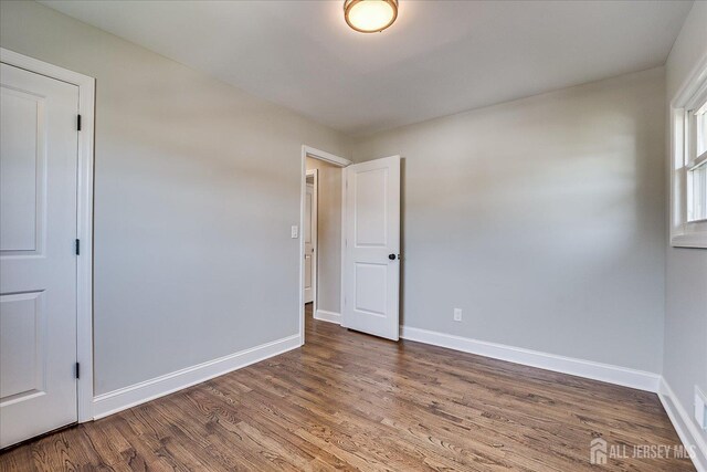 15 Crassas St, Old Bridge, NJ 08879 - empty room featuring wood finished floors and baseboards