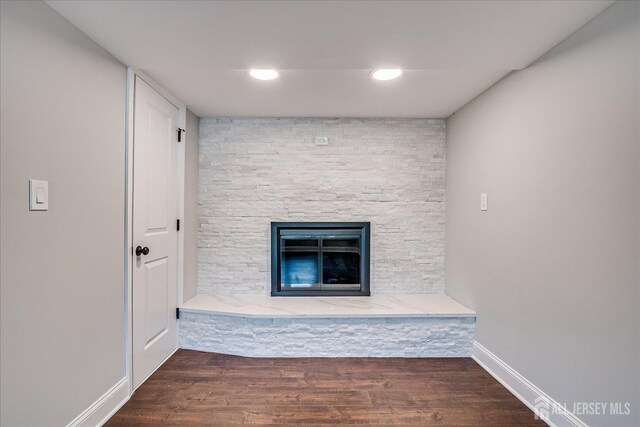 15 Crassas St, Old Bridge, NJ 08879 - detailed view of wood finished floors and a stone fireplace