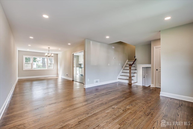 15 Crassas St, Old Bridge, NJ 08879 - empty room featuring stairway, a chandelier, wood finished floors, and recessed lighting