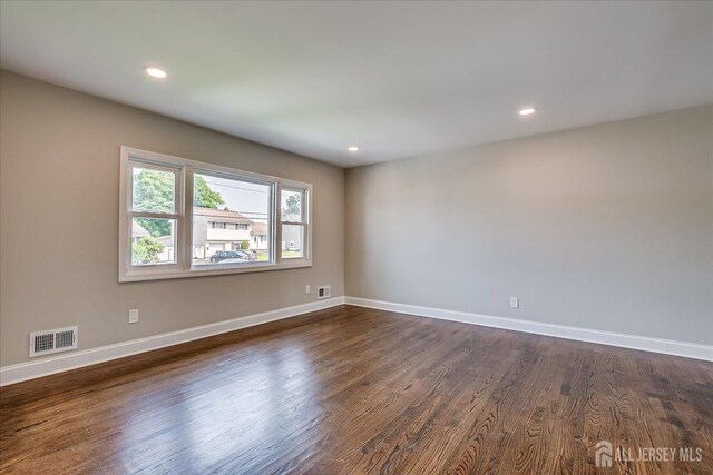 15 Crassas St, Old Bridge, NJ 08879 - unfurnished room featuring dark wood-style floors and recessed lighting