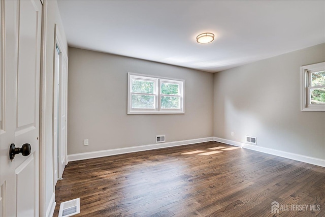 15 Crassas St, Old Bridge, NJ 08879 - unfurnished bedroom featuring dark wood-type flooring and baseboards