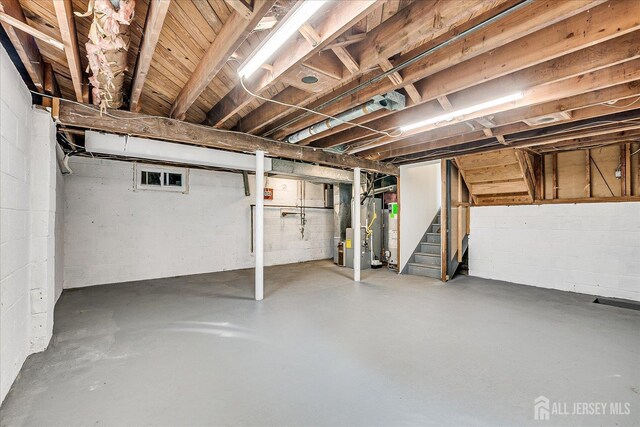 15 Crassas St, Old Bridge, NJ 08879 - unfinished basement with stairs and water heater