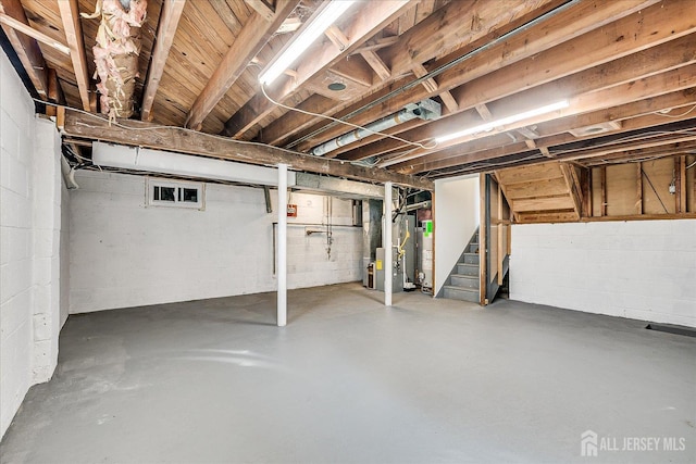 15 Crassas St, Old Bridge, NJ 08879 - unfinished basement featuring stairs and water heater