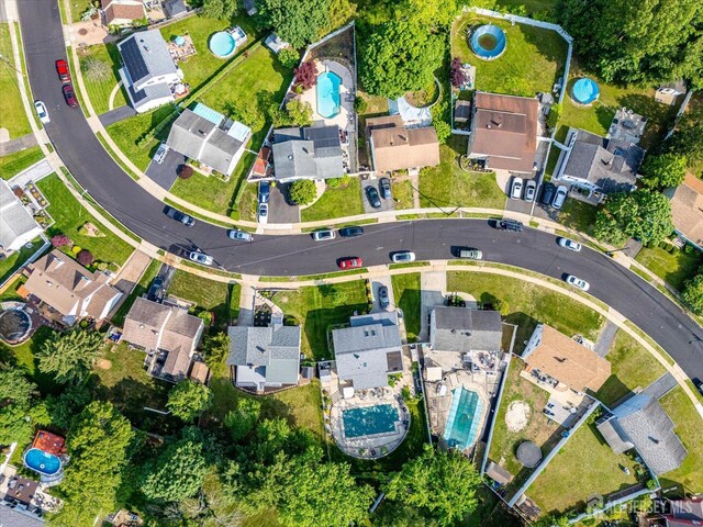 15 Crassas St, Old Bridge, NJ 08879 - aerial view of property and surrounding area with a pool and nearby suburban area