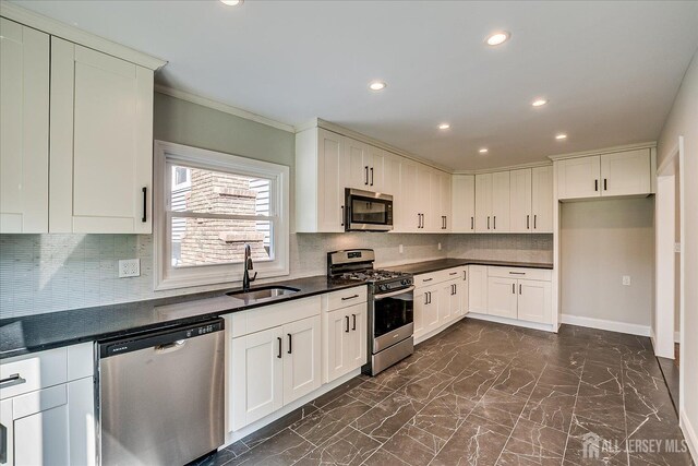15 Crassas St, Old Bridge, NJ 08879 - kitchen with stainless steel appliances, recessed lighting, dark marble finish flooring, tasteful backsplash, and white cabinets