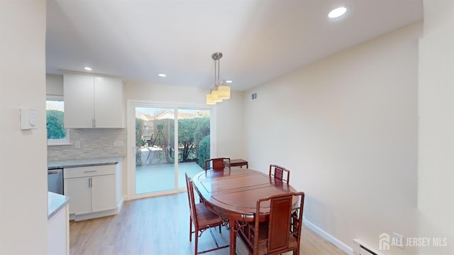 414-D Andover Dr, Monroe, NJ 08831 - dining space with healthy amount of natural light, light wood-style flooring, recessed lighting, a baseboard radiator, and baseboards