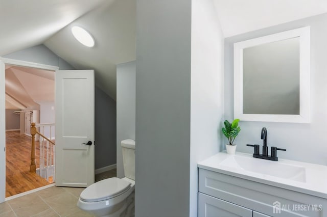 26 Meeker Ave, Edison, NJ 08817 - bathroom featuring vaulted ceiling, toilet, and vanity