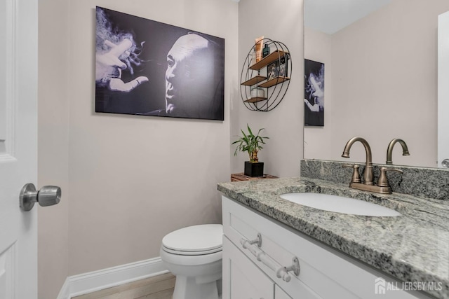 103 Rumford Way, Manalapan, NJ 07726 - bathroom featuring toilet, vanity, and baseboards