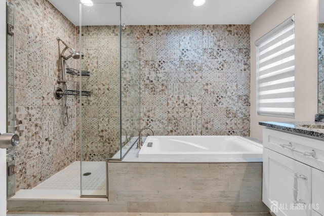 103 Rumford Way, Manalapan, NJ 07726 - bathroom with a shower stall, vanity, and a garden tub