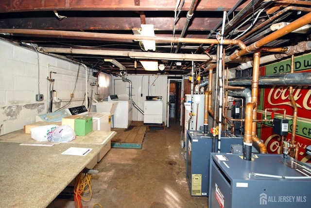 basement with washer and clothes dryer