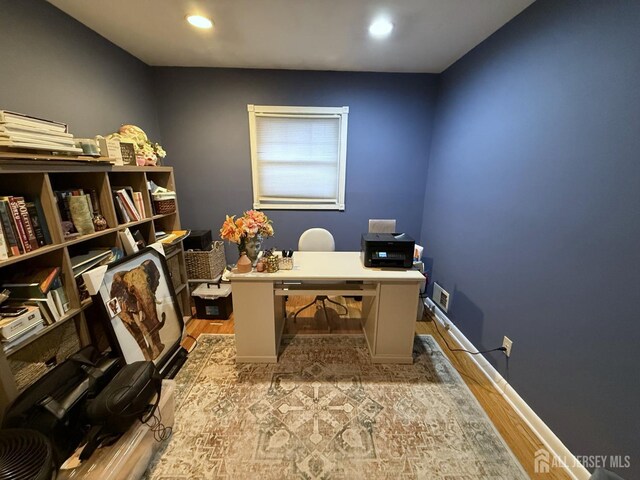 office space featuring light hardwood / wood-style floors