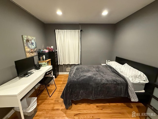 bedroom featuring light hardwood / wood-style flooring