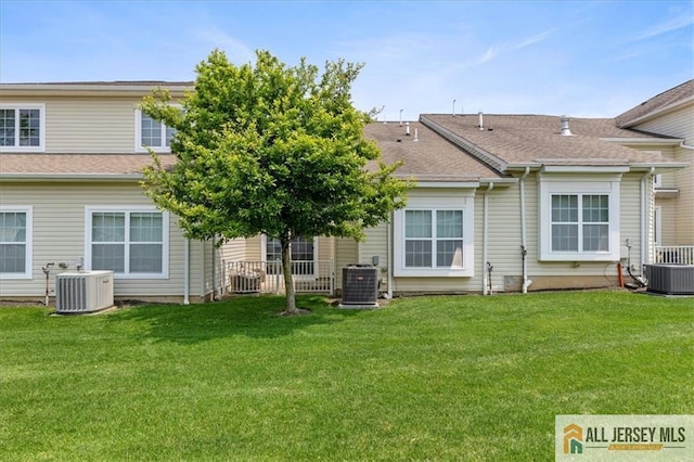 6503 Schindler Dr, South Brunswick, NJ 08852 - rear view of house with a lawn