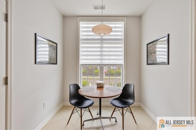 6503 Schindler Dr, South Brunswick, NJ 08852 - dining room with plenty of natural light and light tile patterned floors