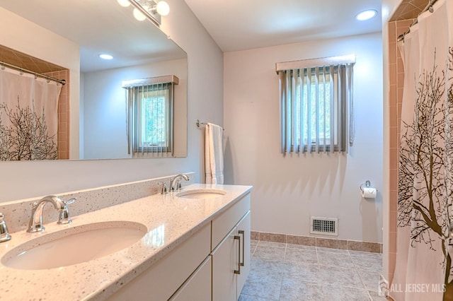 38 Silver Holw, North Brunswick, NJ 08902 - bathroom featuring double vanity, tile patterned floors, baseboards, recessed lighting, and curtained shower