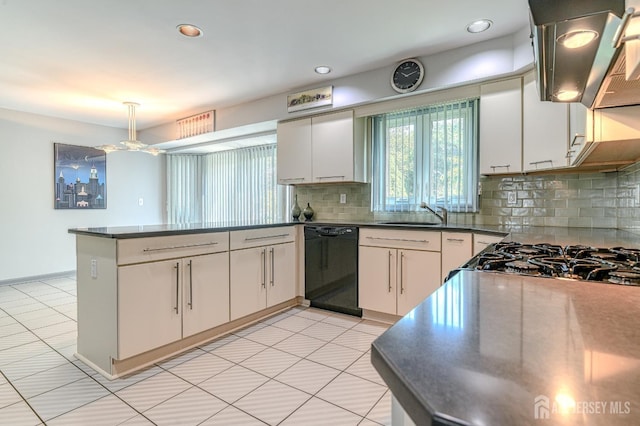 38 Silver Holw, North Brunswick, NJ 08902 - kitchen with black dishwasher, a peninsula, a sink, dark countertops, and recessed lighting
