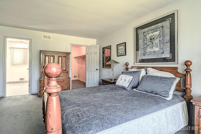 38 Silver Holw, North Brunswick, NJ 08902 - carpeted bedroom featuring a spacious closet, ensuite bath, and baseboards