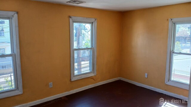 154 Townsend St, New Brunswick, NJ 08901 - spare room with baseboards