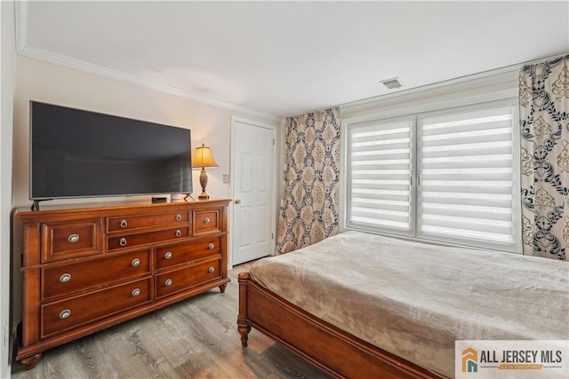 52 State Route 33rd St, Freehold Twp, NJ 07728 - bedroom with wood finished floors and crown molding