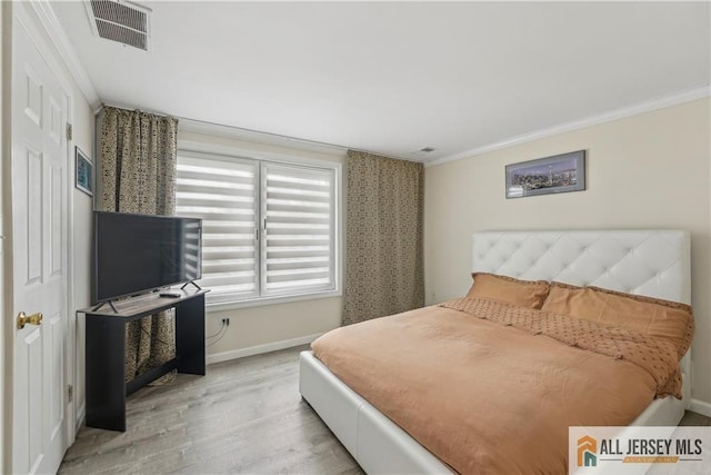 52 State Route 33rd St, Freehold Twp, NJ 07728 - bedroom featuring crown molding and wood finished floors