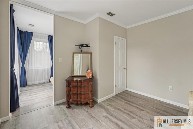 52 State Route 33rd St, Freehold Twp, NJ 07728 - empty room with wood finished floors and crown molding
