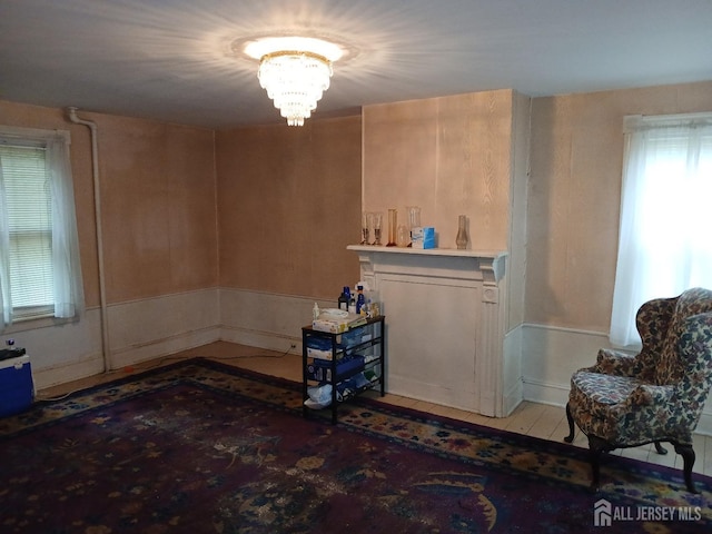 unfurnished room featuring a notable chandelier