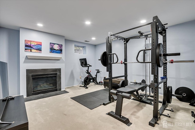 exercise area with carpet flooring