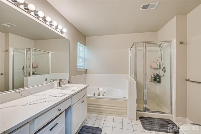 bathroom with tile patterned floors, plus walk in shower, and vanity