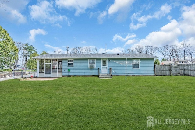back of house with a sunroom