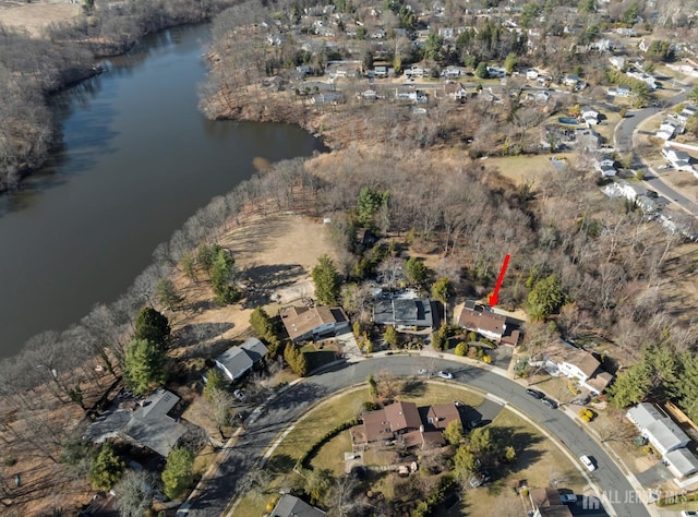 drone / aerial view featuring a water view