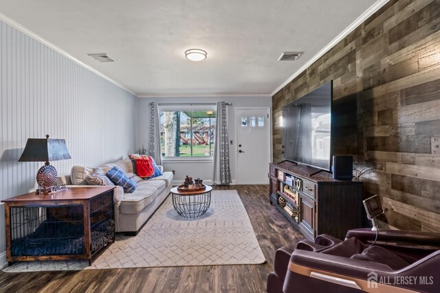 8 Martha Blvd, Sayreville, NJ 08879 - living room featuring crown molding, dark wood-style flooring, and wooden walls