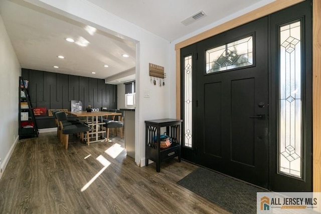 entrance foyer featuring wood-type flooring