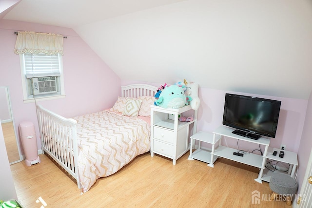 1457 George St Unit 61, Plainfield, NJ 07062 - bedroom with wood finished floors, cooling unit, and lofted ceiling