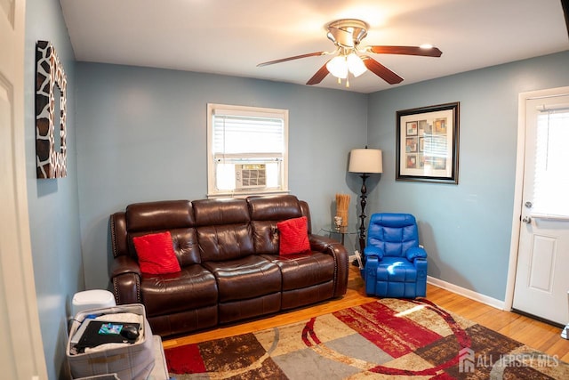 1457 George St Unit 61, Plainfield, NJ 07062 - living area with plenty of natural light, ceiling fan, wood finished floors, and cooling unit