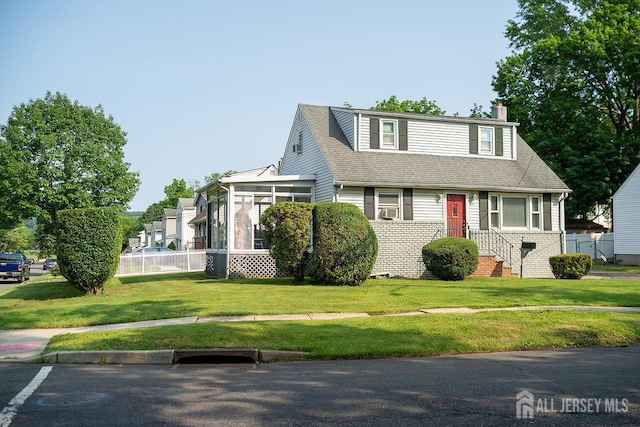 1457 George St Unit 61, Plainfield, NJ 07062 - view of front of home featuring a chimney, a sunroom, and a shingled roof