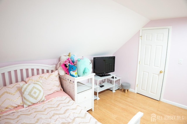 1457 George St Unit 61, Plainfield, NJ 07062 - bedroom with vaulted ceiling and wood finished floors