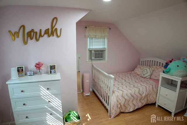 1457 George St Unit 61, Plainfield, NJ 07062 - bedroom with light wood-style flooring and vaulted ceiling