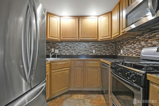 385 Shoreland Cir, Old Bridge, NJ 08879 - kitchen featuring stainless steel appliances, dark countertops, decorative backsplash, and stone finish flooring