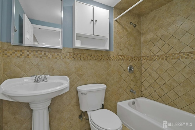 385 Shoreland Cir, Old Bridge, NJ 08879 - bathroom with shower / tub combination and tile walls