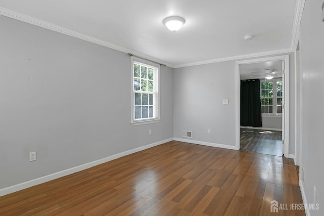 385 Shoreland Cir, Old Bridge, NJ 08879 - unfurnished room with crown molding, wood finished floors, and a smoke detector
