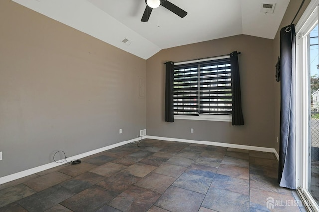 385 Shoreland Cir, Old Bridge, NJ 08879 - unfurnished room with vaulted ceiling, a ceiling fan, and stone tile floors