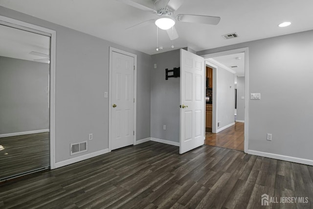 385 Shoreland Cir, Old Bridge, NJ 08879 - unfurnished bedroom with dark wood-style flooring, a ceiling fan, and recessed lighting